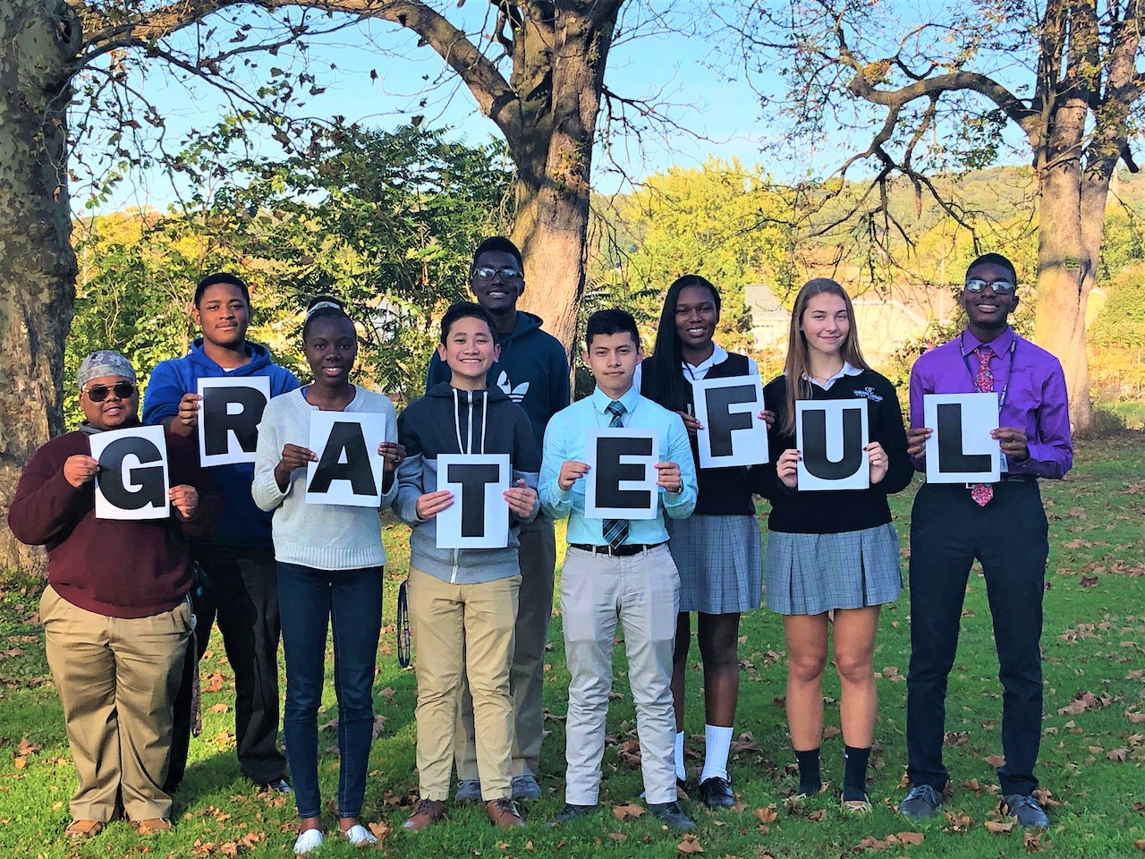 Students Holding Grateful Sign